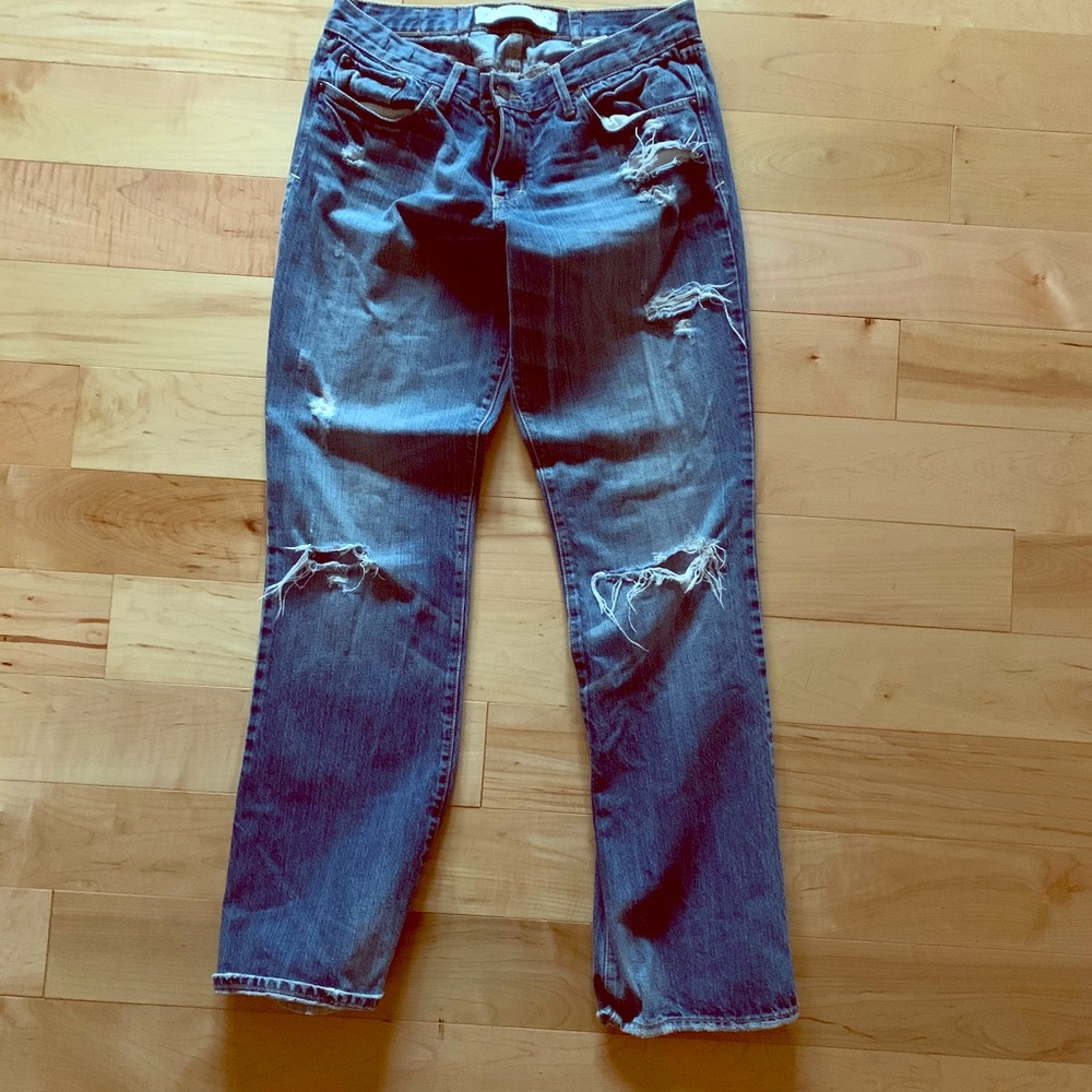 Straight legged torn jeans